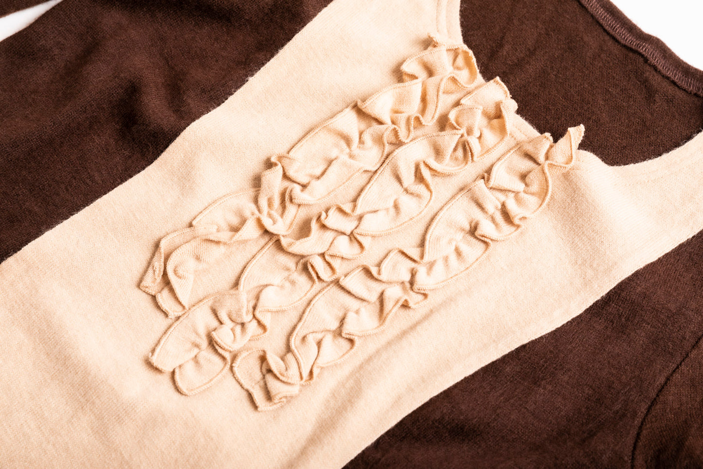 着やせデザインのニットチュニック